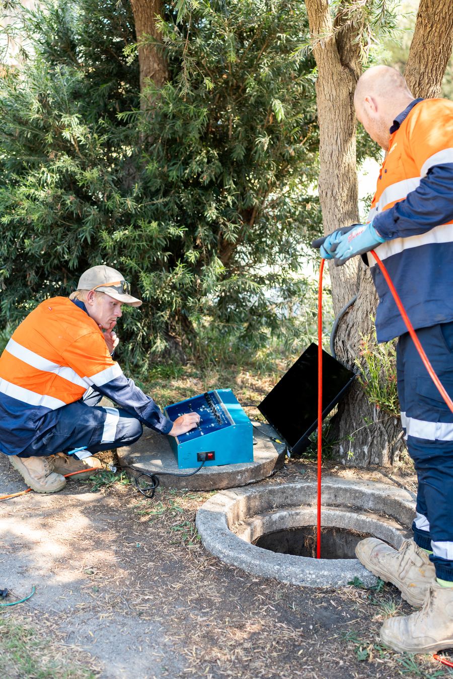 KBC technician running a CCTV inspection at a manhole