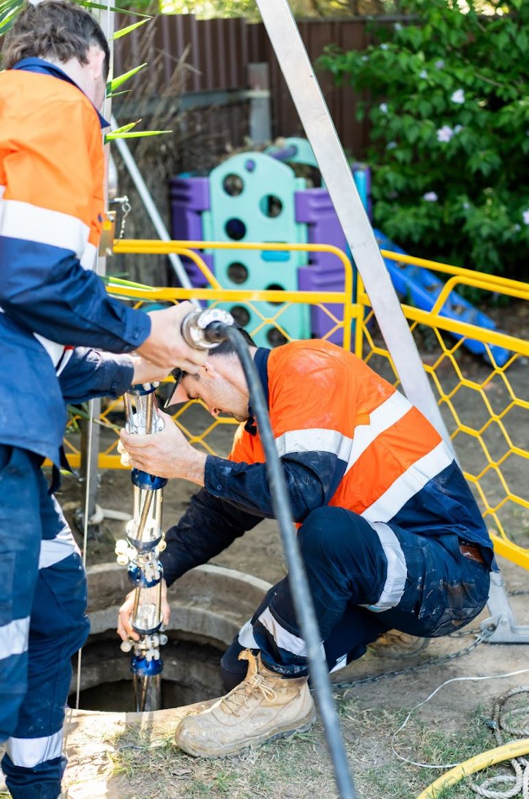 KBC crew working at a manhole
